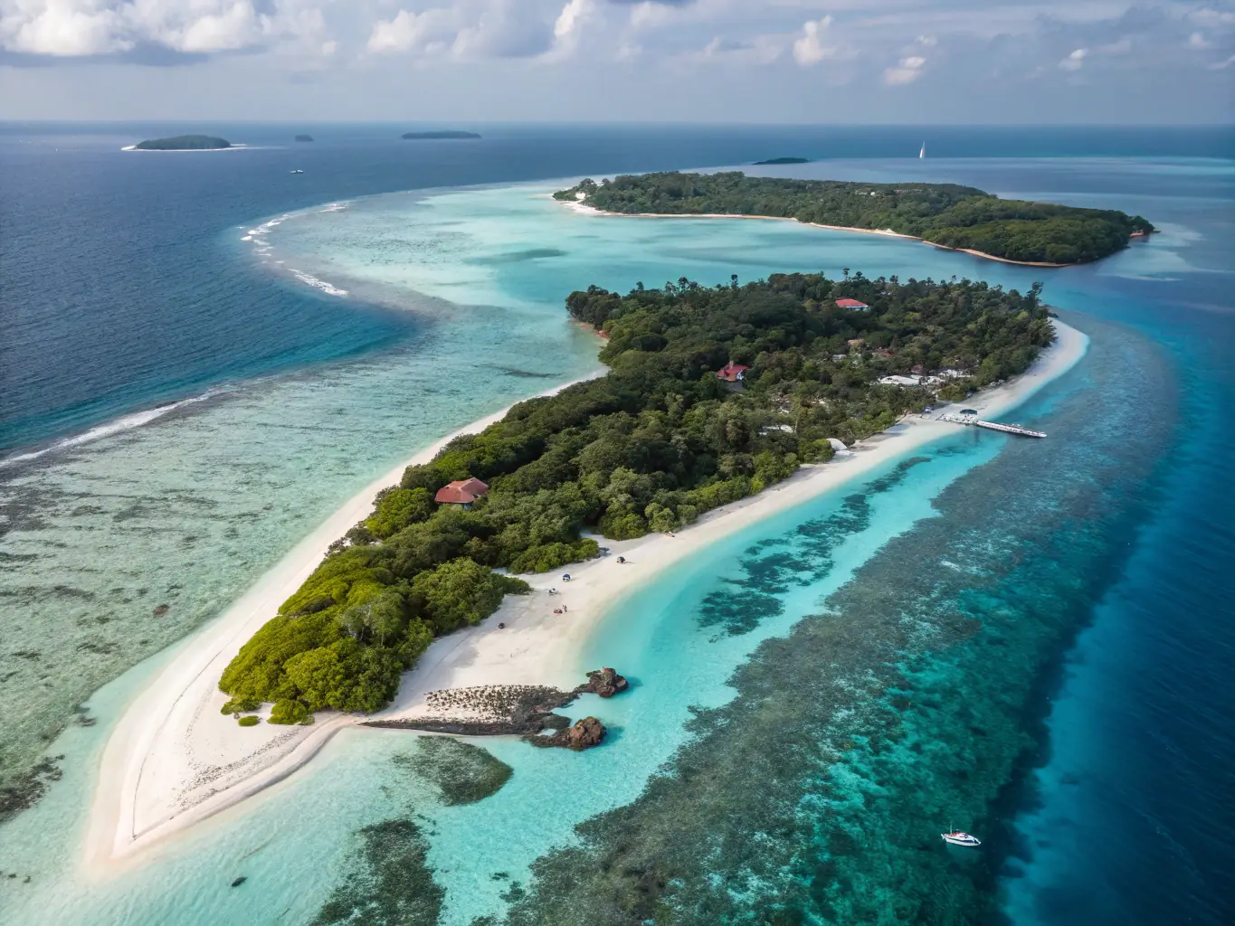 A picturesque view of a luxurious overwater bungalow on a private island in the Maldives, with crystal-clear waters and white sandy beaches. This represents the 'Luxury Escape' tour.