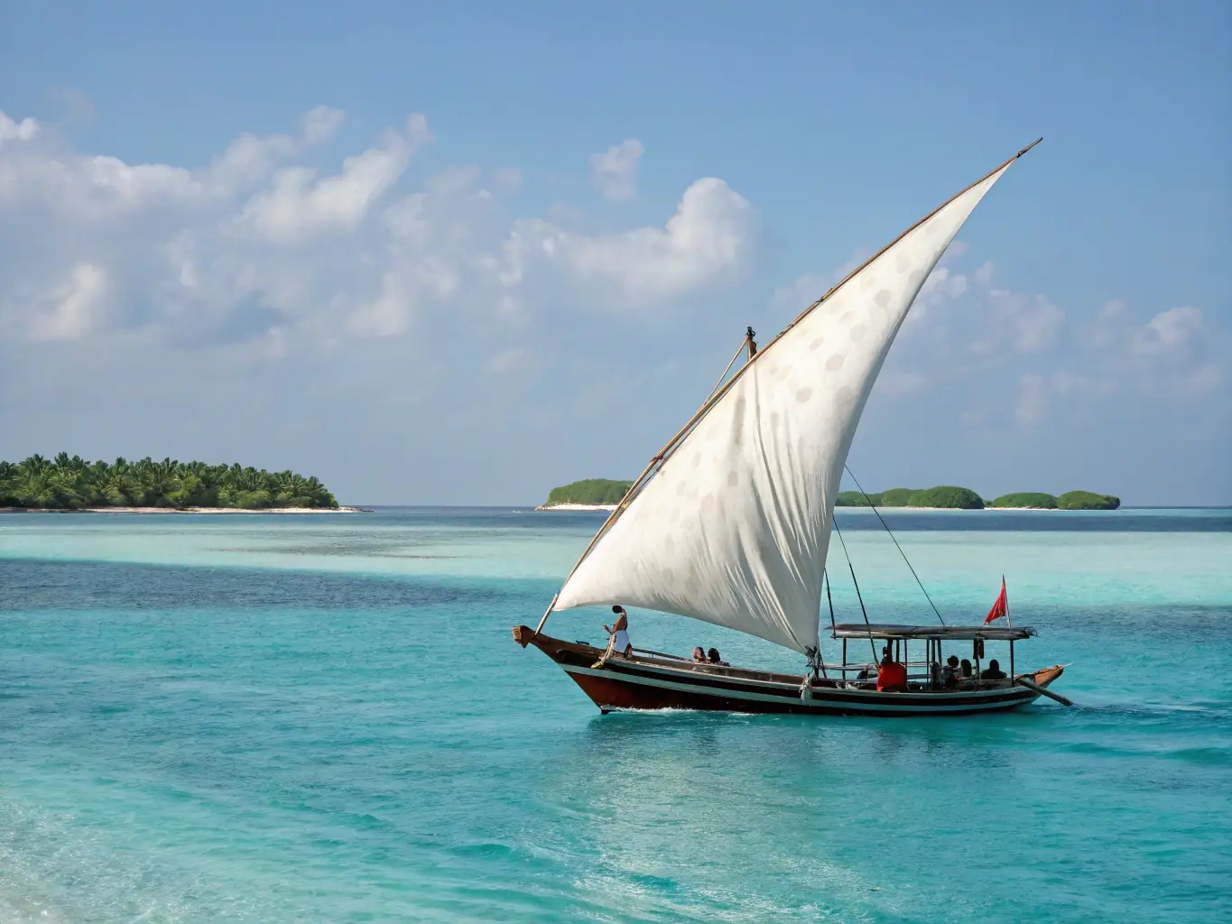 A stunning image of a traditional Maldivian Dhoni boat sailing across the turquoise waters of the Indian Ocean at sunset. The scene evokes a sense of tranquility and adventure, highlighting the unique cultural experiences offered on the island tours.